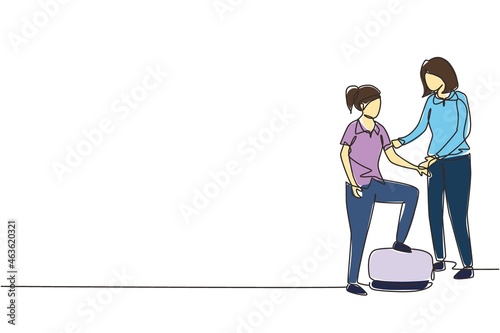 Single one line drawing woman therapist helping young female patient stepping up the stairs, medical rehabilitation, physical therapy activity. Continuous line draw design graphic vector illustration