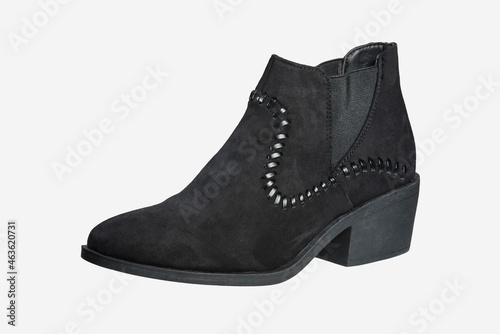 Black female suede boots on a white background
