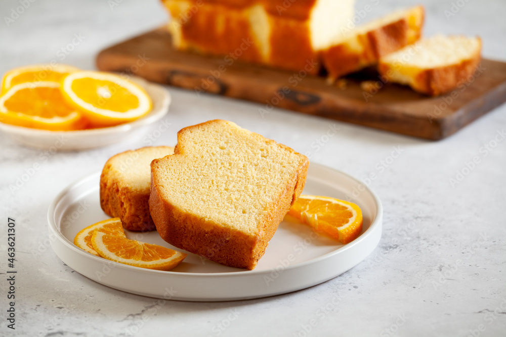 Slices of homemade cake with oragnic oranges Slices of homemade cake with oragnic oranges