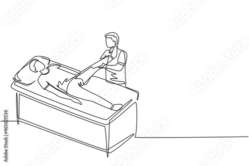 Single one line drawing therapist helping patient to raise leg for exercise. Physical therapy treatment. Rehabilitation center. Passive and active exercise. Continuous line draw design graphic vector