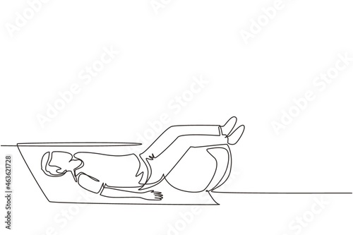 Continuous one line drawing physiotherapy rehabilitation isometric composition with man character lying on mat with legs on rubber ball. Healthcare concept. Single line draw design vector illustration