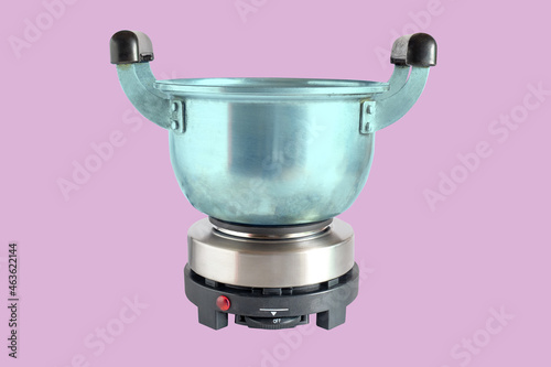 Pot on electric stainless steel stove or multi funtional coffee stove.kitchenware. photo