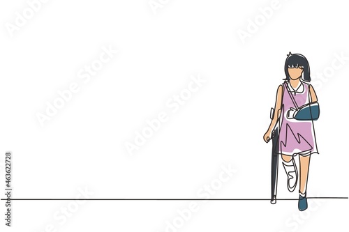 Single continuous line drawing sad injured girl with broken arm and leg in gypsum. Full length of upset injured little girl standing on crutches. One line draw graphic design vector illustration