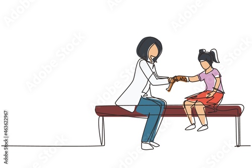 Single one line drawing little kid on consultation with orthopedic doctor. Children's doctor works with little girl. Orthopedist bandages girl's hand. Continuous line draw design vector illustration