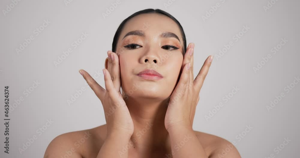 Close up of Beauty Asian woman face looking at camera Close up of Beauty Asian woman face looking at camera
