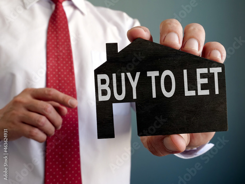 Bild auf Leinwand The manager offers buy to let property for investment.