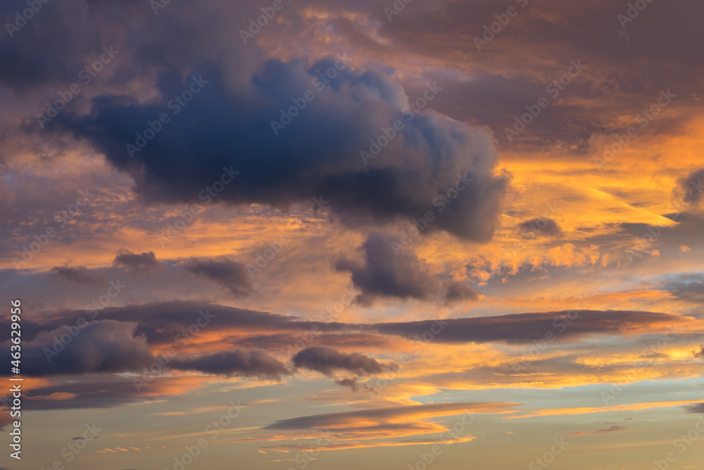 dramatic purple and orange clouds in the sky at sunset on the Mediterranean coast colorful background