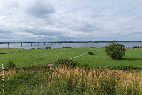 Beautiful view of the green field of the Roskilde fjord, Denmark photo