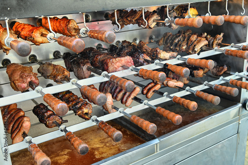 Typical Brazilian churrascaria meat barbeque at a street food fair in Turin, Italy photo