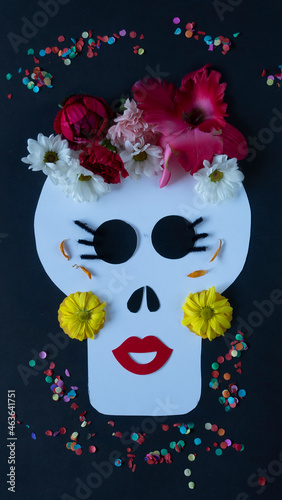 Fototapeta Naklejka Na Ścianę i Meble -  16x9 Vertical photo serie with different designs about Day of the Dead Skull Calavera Catrina made of paper and flowers. Design version number 4 of 15 (see others)