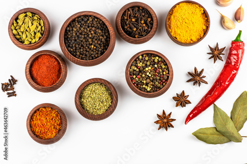 Fresh vegetables and spices isolated on a white background.  Free space. Top view.