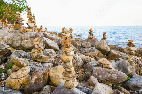 Stone stacked on rock beach at Laem Hua Mong - Kho Kwang Viewpoint in Chomphon province Thailand photo