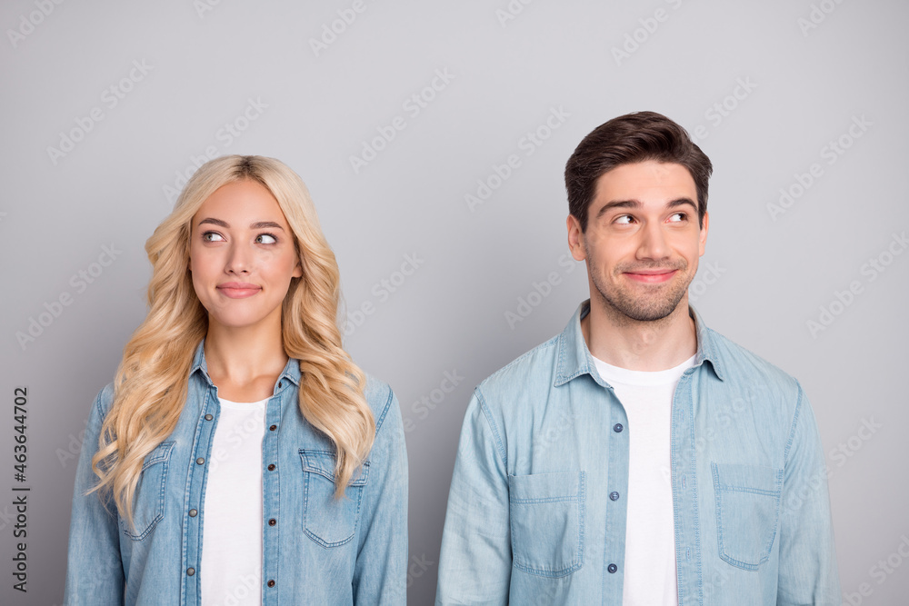Portrait of attractive cheery minded couple creating solution thinking isolated over gray pastel color background Portrait of attractive cheery minded couple creating solution thinking isolated over gray pastel color background