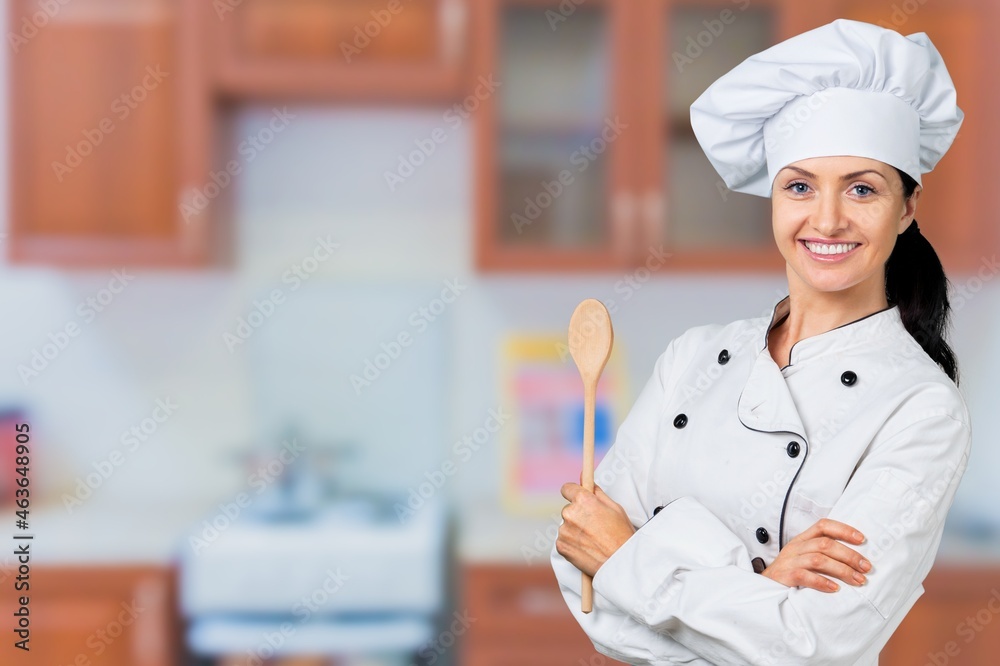 cheerful lady holding kitchen wares, food concept
