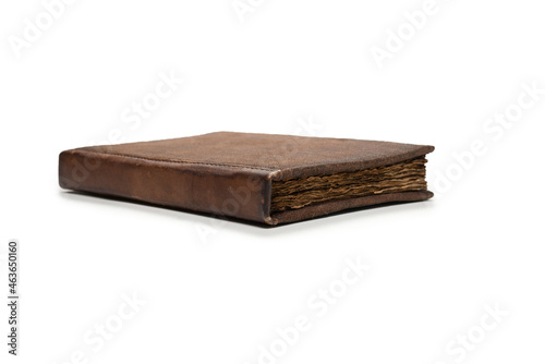 An old brown book isolated on white background.