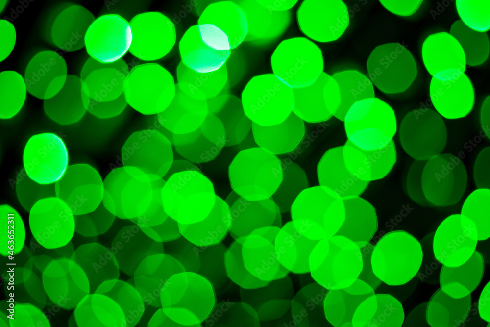 Defocused Green abstract bokeh lightson black background. Defocused Green abstract bokeh lightson black background.