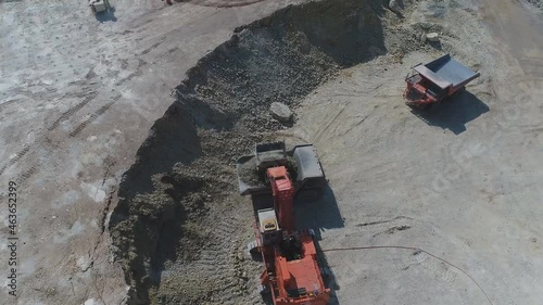 Aerial view of large mining vehicles at a mining quarry (China) photo