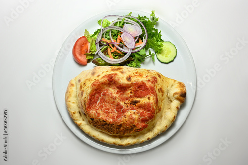 calzone pizza in plates