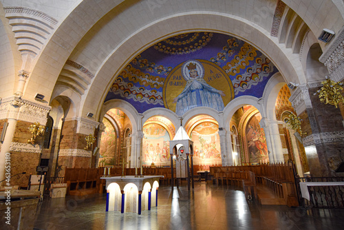 Lourdes, France - 9 Oct, 2021: Religious art and architecture within the Basilica Sanctuary of Our Lady of Lourdes photo