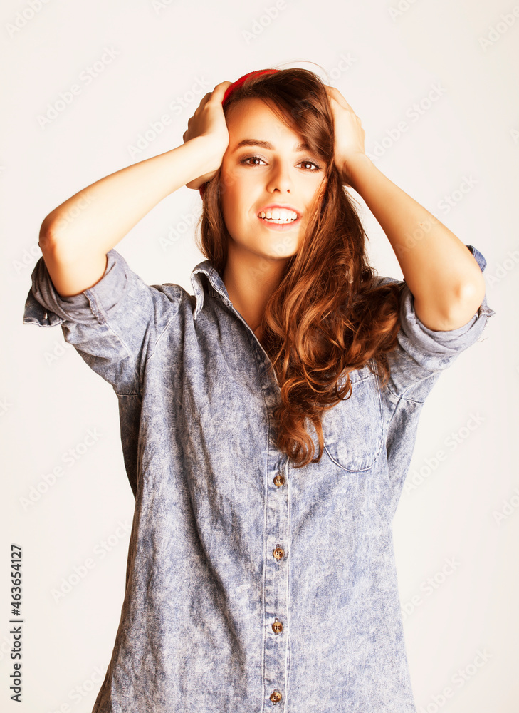 young cheerful brunette teenage girl on white background young cheerful brunette teenage girl on white background