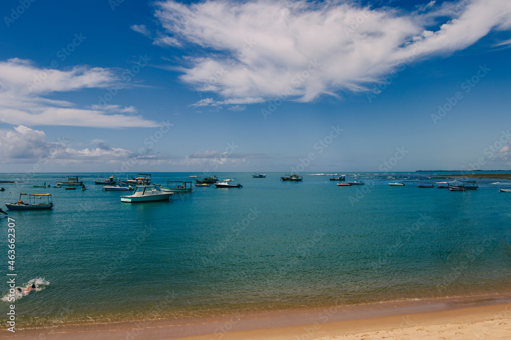 Boats and speedboats on the coast of Praia do Forte - Bahia