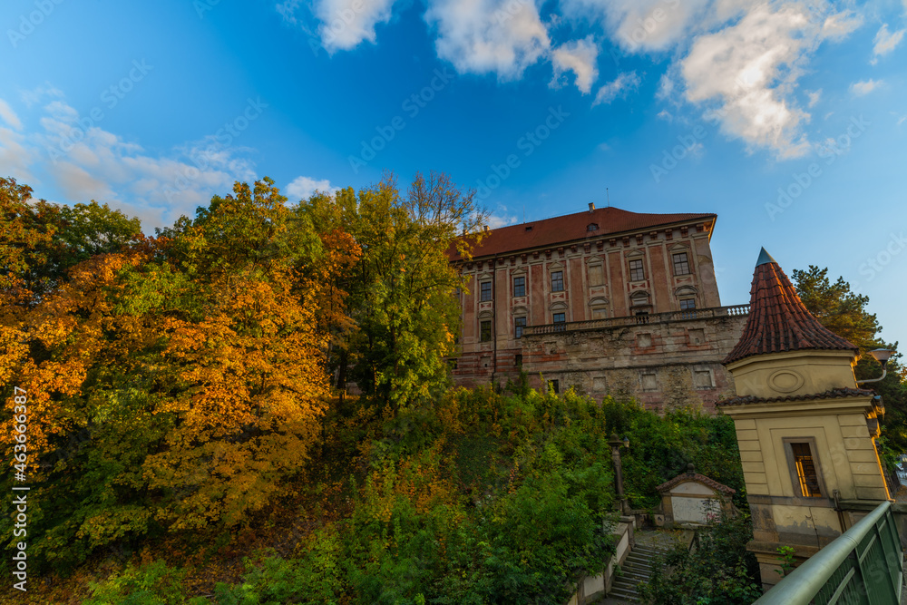 Sunset in Roudnice nad Labem town with old church and towers with Labe river