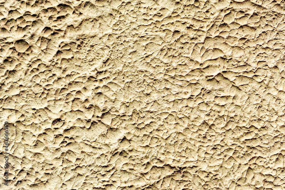 Texture of a concrete wall with cracks and scratches which can be used as a background Texture of a concrete wall with cracks and scratches which can be used as a background
