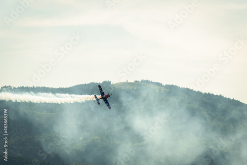 Airshow in St. Wolfgang im Salzkammergut over Wolfgangsee lake with the mountains in the background, Austria