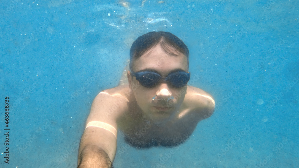 Man swimming under the water, Mediterranean sea