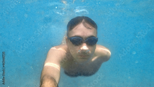 Man swimming under the water, Mediterranean sea