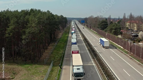 Trucks in a traffic jam on a German motorway.  The trucks are on their way to Poland to get to Ukraine.