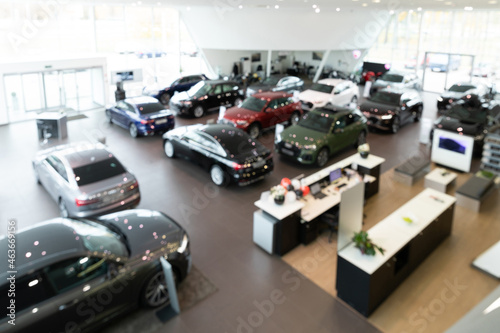 large dealership of premium cars, panorama, photo with blur