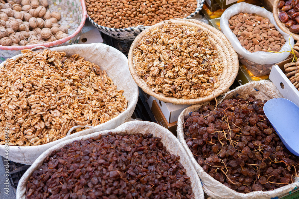 Morrocan local market on the streets with spices, nuts, fish, fruits and vegetables.