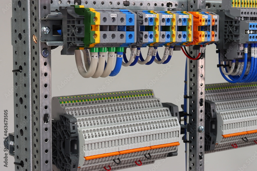 4-level and 1-level pass-through terminals for connecting loads in the electrical panel.