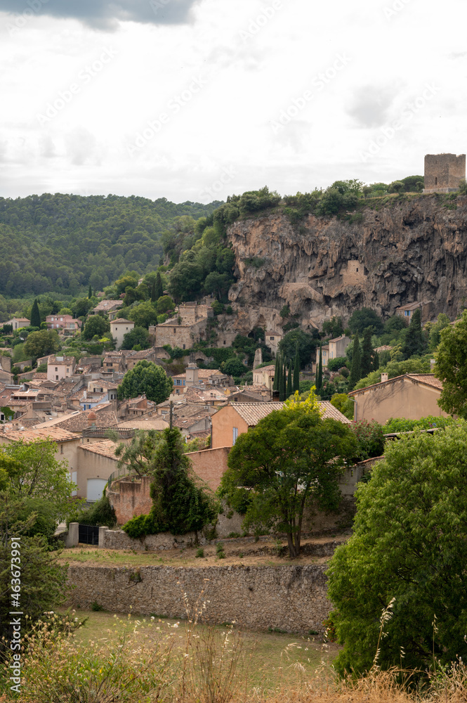 Small old village in hear of Provence Cotignac with famous cliffs with cave dwellings