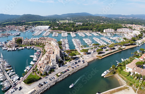 Aerial view on small houses and sailboats of Port Grimaud and port Cogolin, French Riviera, Provence, France