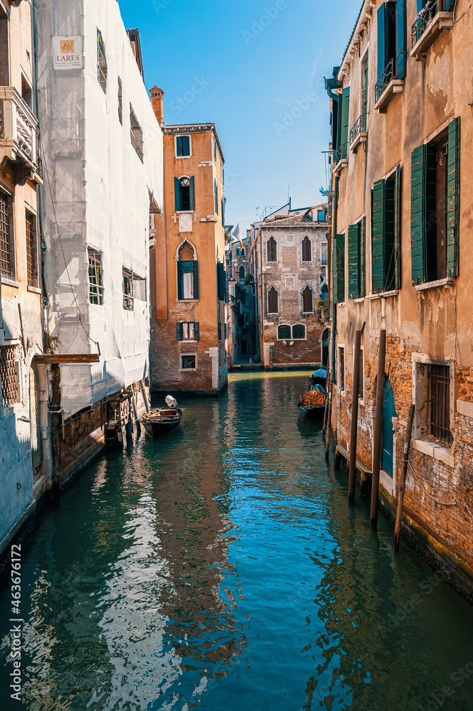 Venetian Canal. Beautiful romantic view of the ancient buildings of Venice