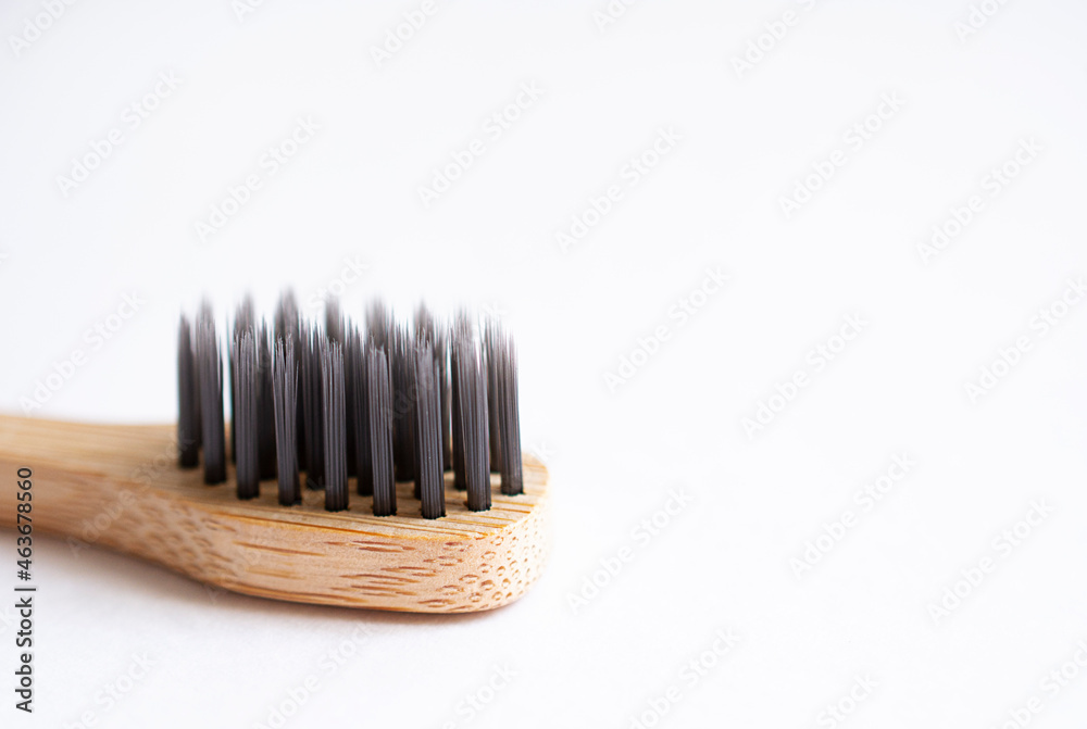 natural toothbrush made of bamboo on white backgrounds with free copy space natural toothbrush made of bamboo on white backgrounds with free copy space