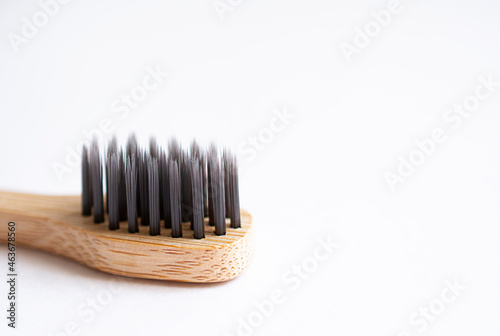 natural toothbrush  made of bamboo on white backgrounds with free copy space