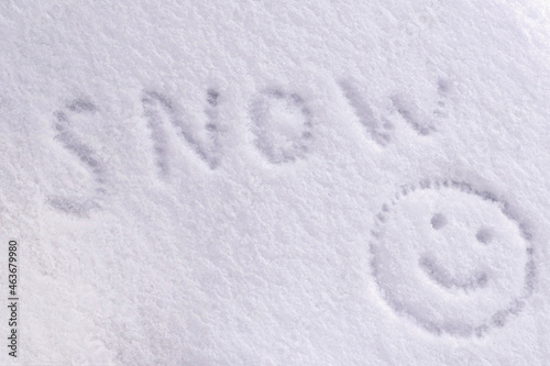 snow texture is drawn with a smiley face and the inscription snow