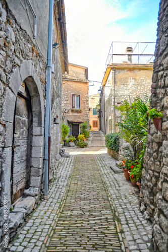 Fototapeta Naklejka Na Ścianę i Meble -  A narrow street of Castro dei Volsci in medieval town of Lazio region, Italy.