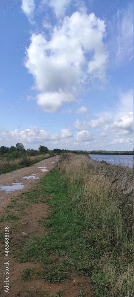 lake against the background of blue sky and clouds