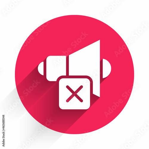 White Speaker mute icon isolated with long shadow. No sound icon. Volume Off symbol. Red circle button. Vector