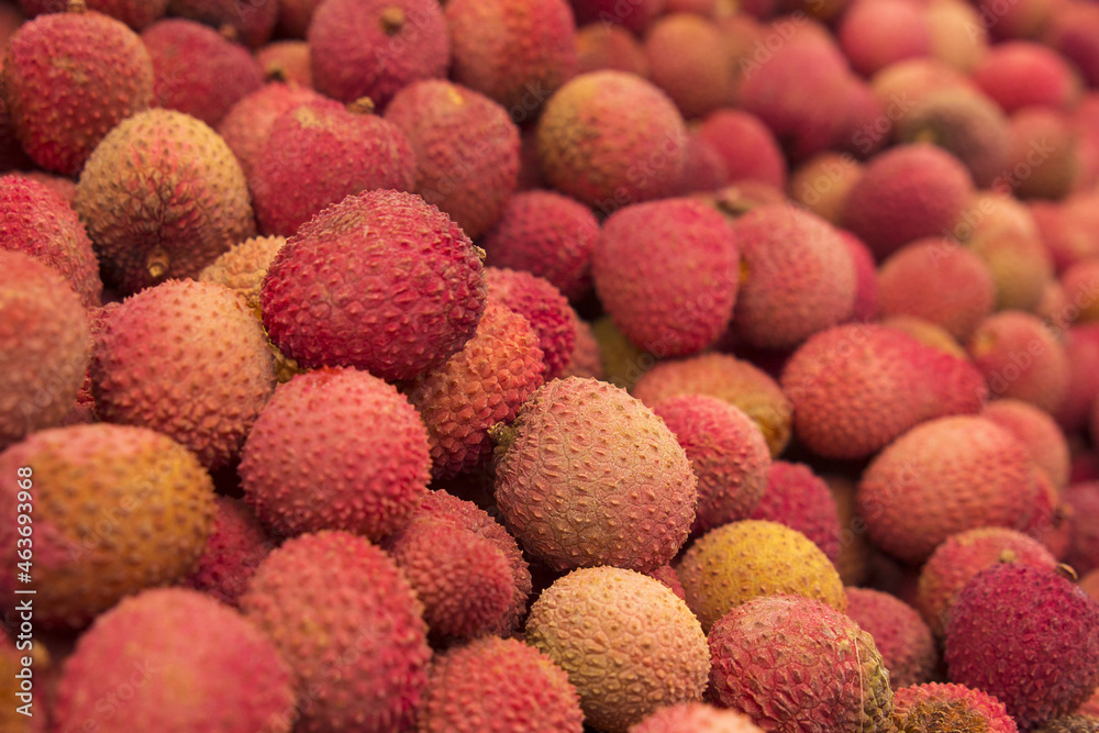 Fresh red litchi, lichee, lychee, or lichi, Litchi chinensis background.