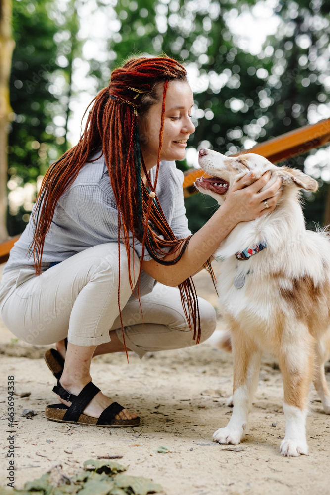 Portrait of funny girl with dog Portrait of funny girl with dog