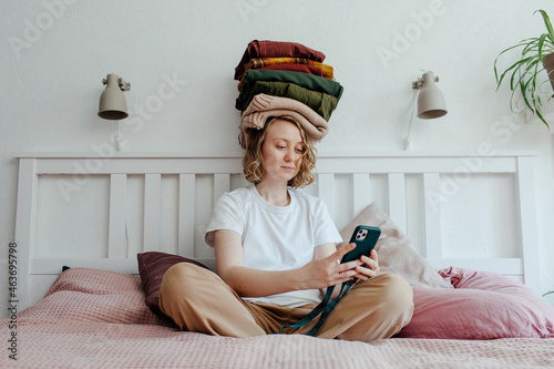Woman solving problem of unnecessary things photo