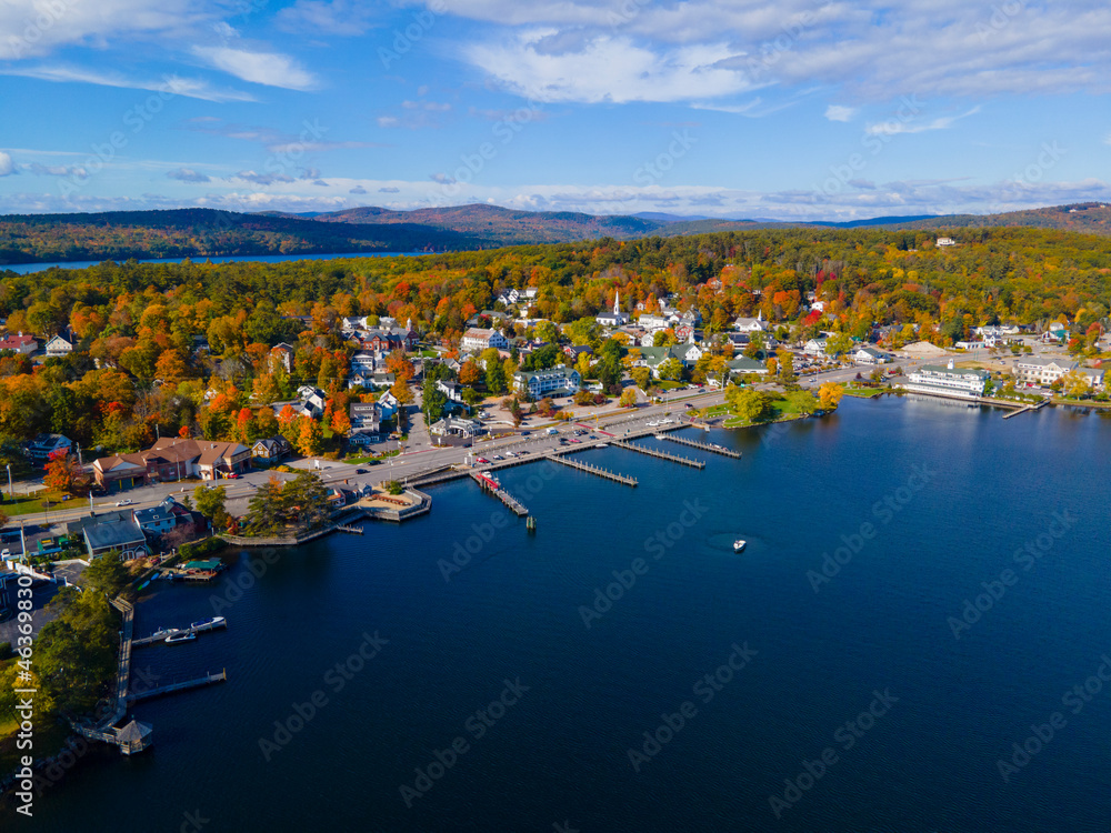 Meredith town center with fall foliage aerial view in fall with Meredith Bay in Lake Winnipesaukee, New Hampshire NH, USA. 