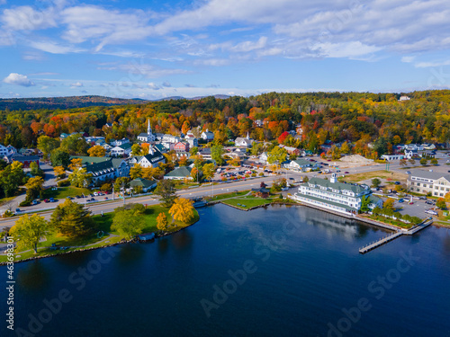 Meredith town center with fall foliage aerial view in fall with Meredith Bay in Lake Winnipesaukee, New Hampshire NH, USA.  photo