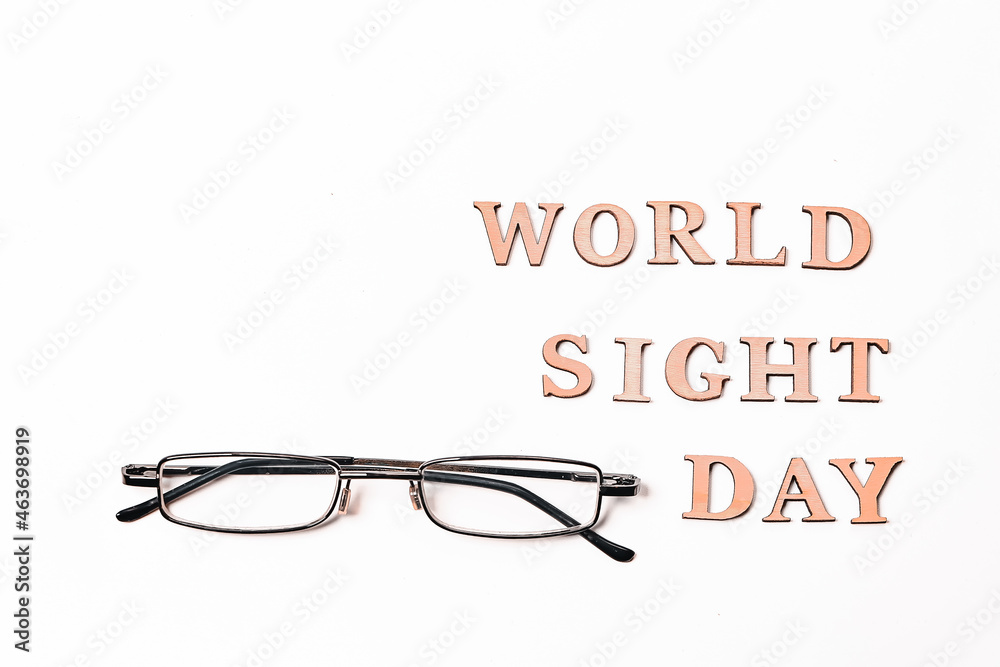 World Sight Day on 10th October. Copy Space. Glasses for improving vision. Flat lay. Top view. World Sight Day on 10th October. Copy Space. Glasses for improving vision. Flat lay. Top view.