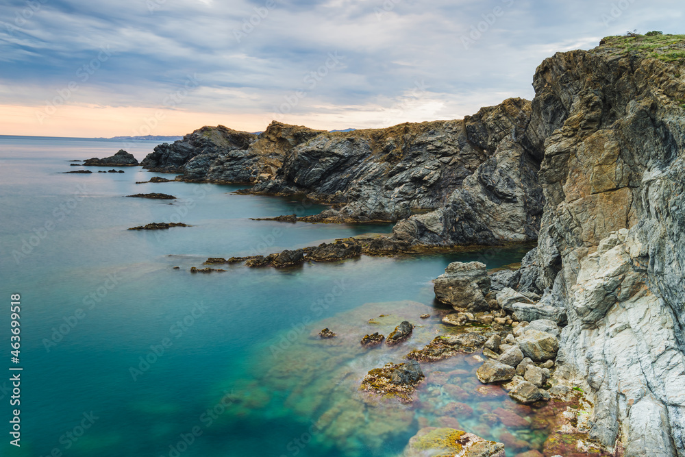 Amazing sunrise at the rocky coasatline of Mediterranea Sea (Costa Brava, Catalonia, Spain, Alt Emporda)